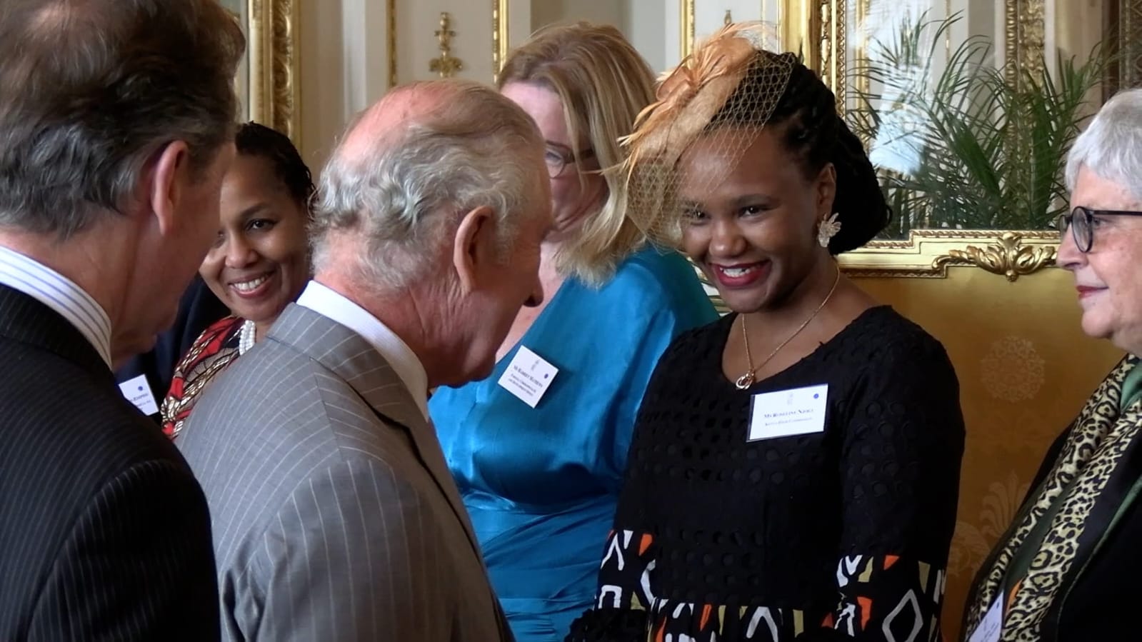 King Charles III with PS Roseline Njogu at the Buckingham Palace.